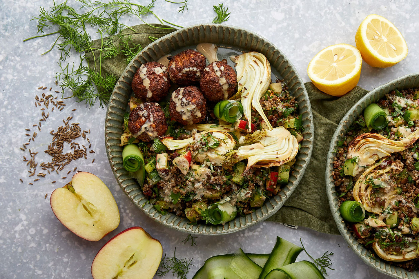Bowl of quinoa and fennel salad with Moroccan falafals