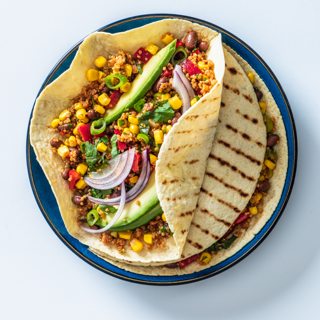 Spanish Style Quinoa with beans and avocado in a wrap