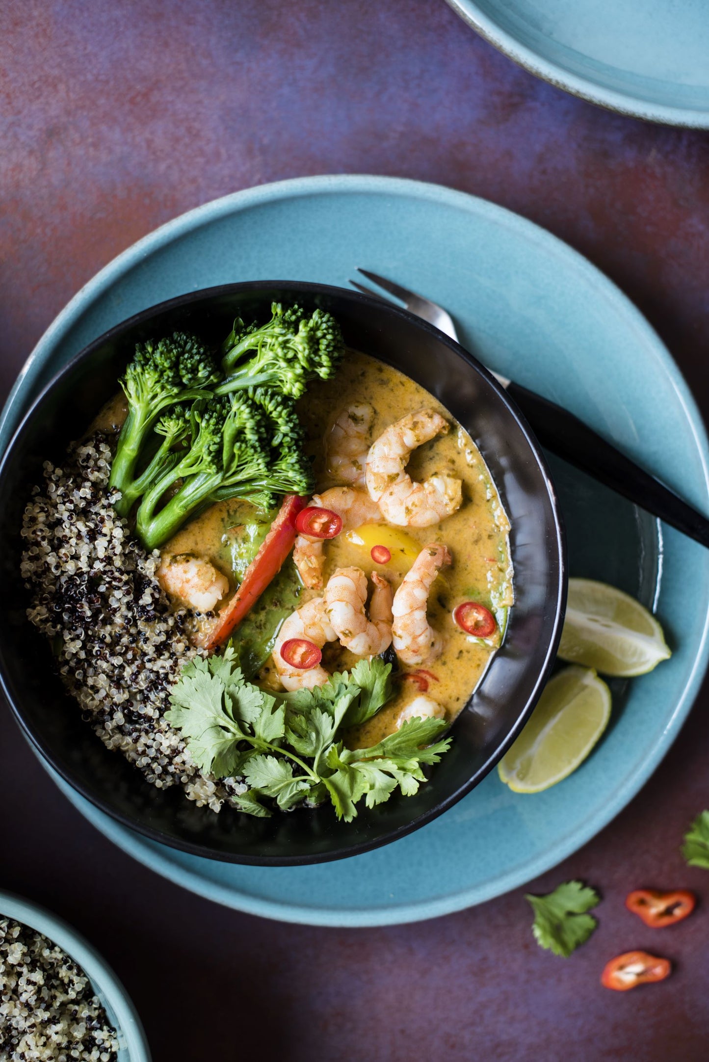 bowl of quinoa with prawn curry and broccoli
