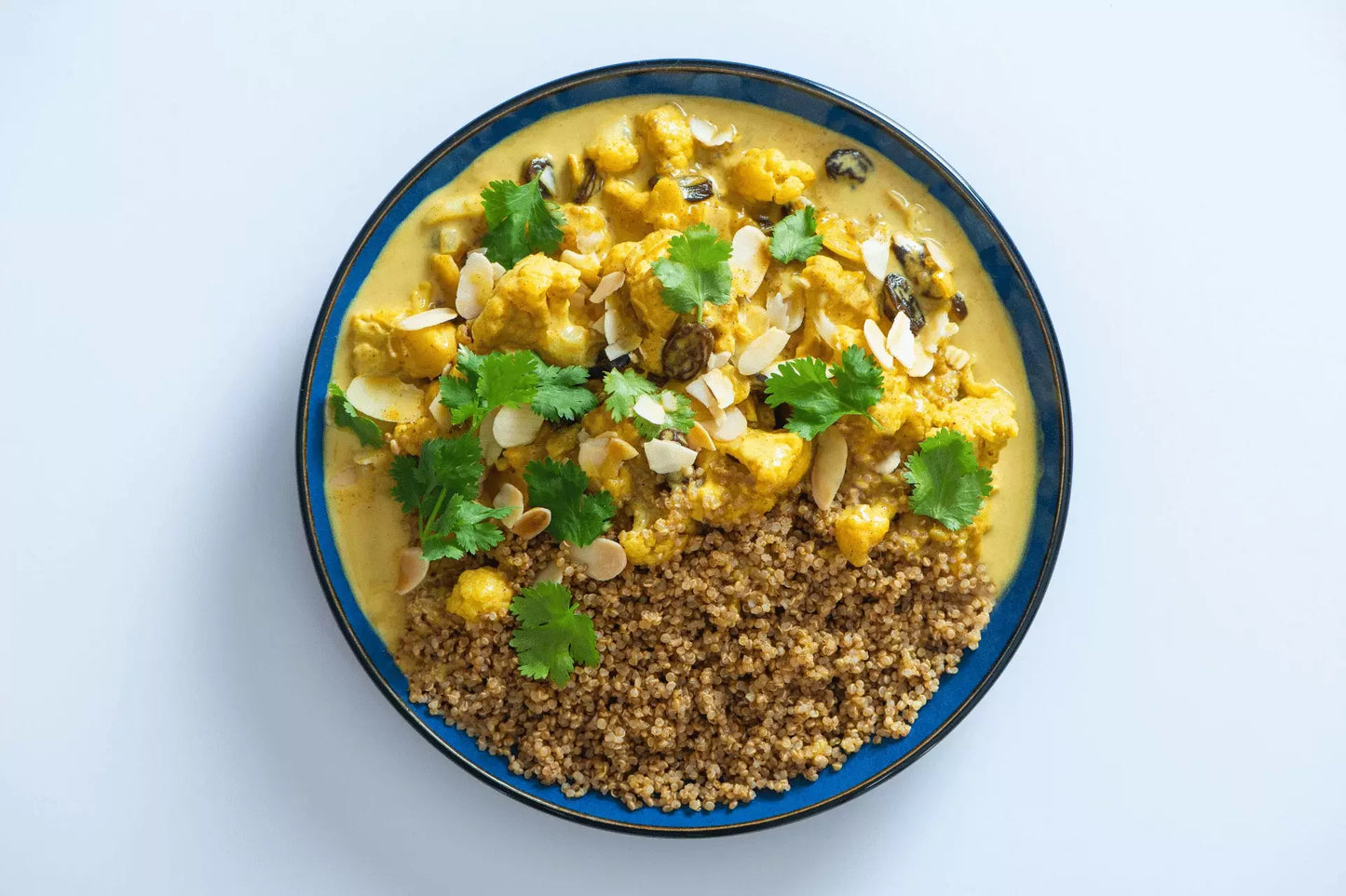 Bowl of cauliflower curry and quinoa