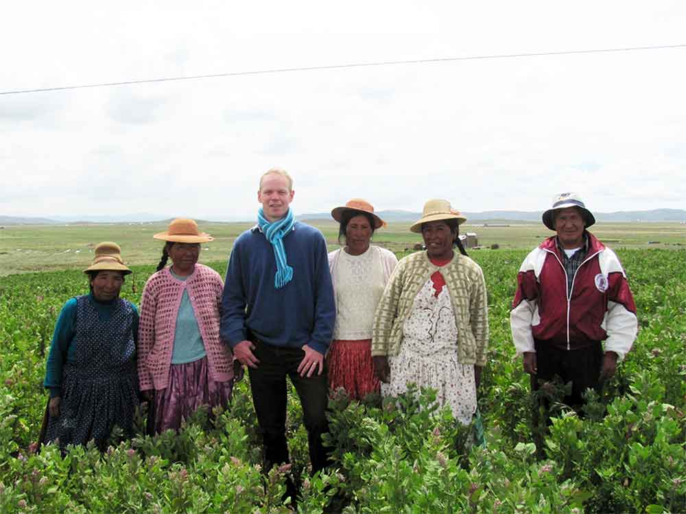 Group of people in a quinoa field
