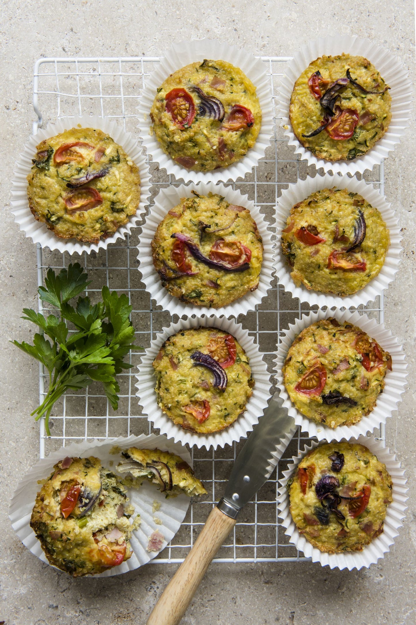 Cake cups filled with quinoa baked cheese and ham bites
