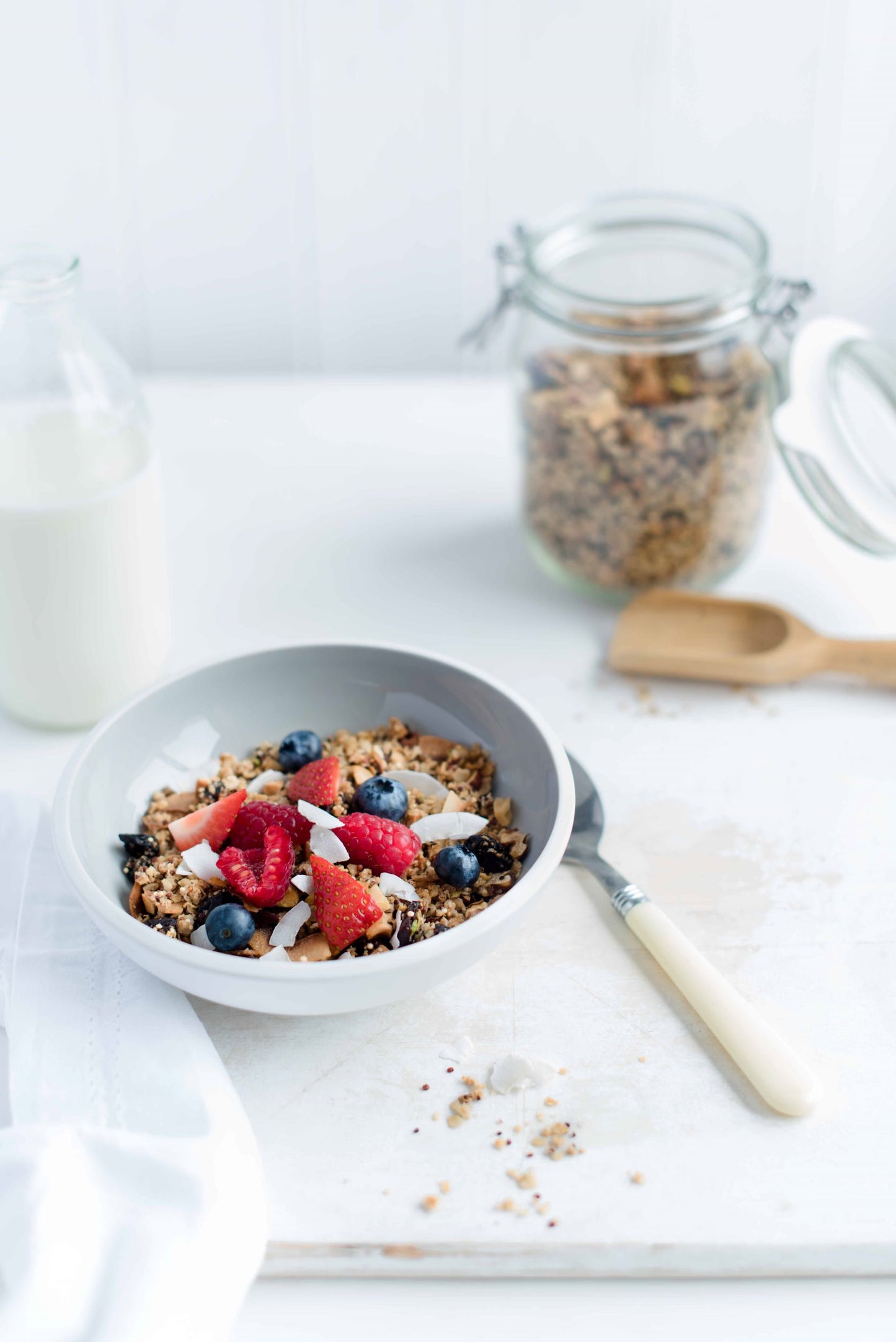 bowl of quinoa granola and fruit