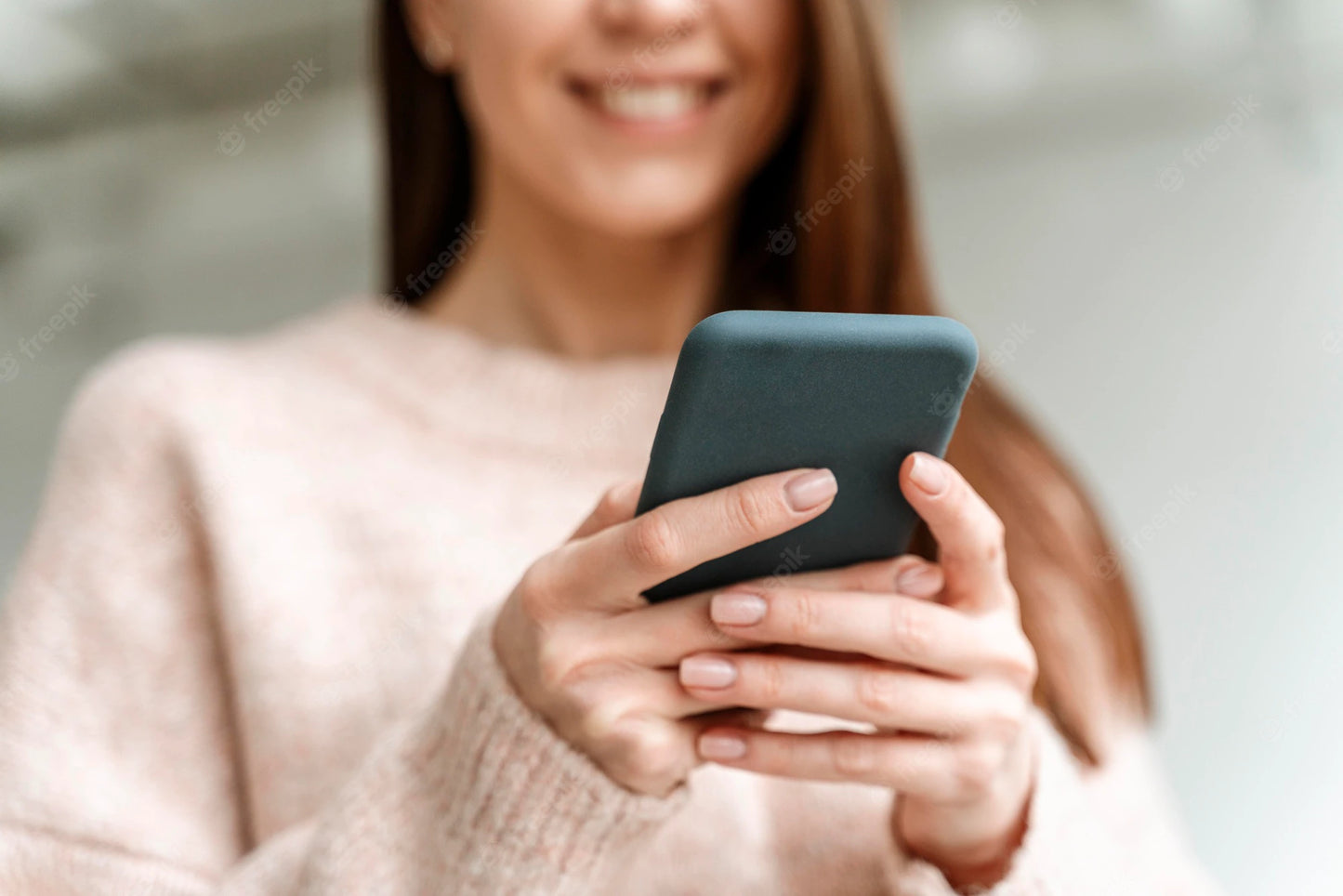 women looking at phone