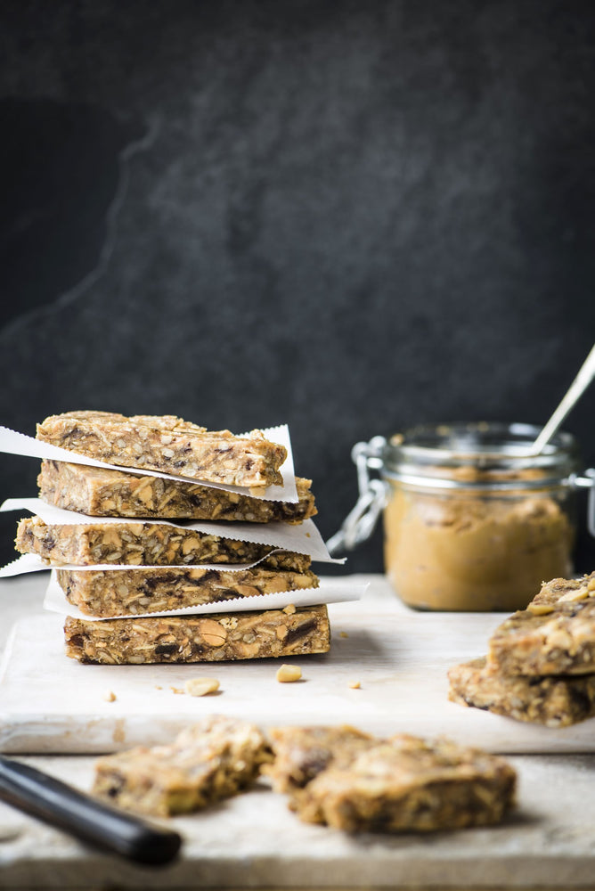 a stack of peanut butter and quinoa breakfast bars 