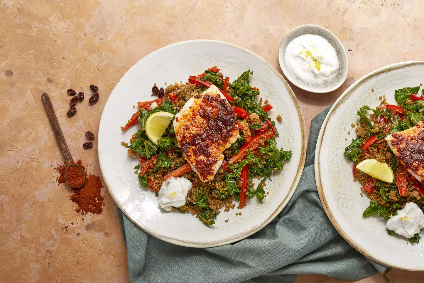 Plate of quinoa with a spiced cod and yoghurt 