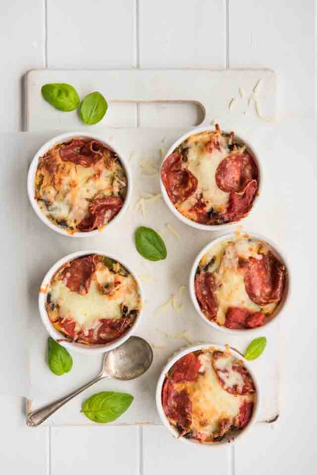 quinoa pizza cups with melted mozzarella 