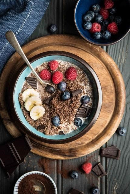 bowl of quinoa chocolate porridge with fruit 