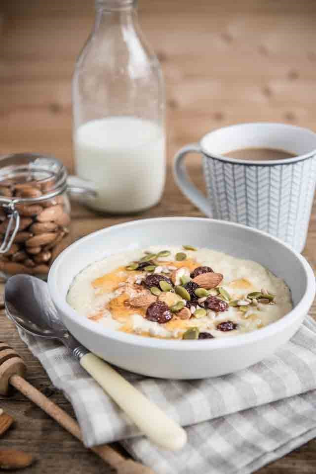 Quinoa porridge topped with nuts and seeds